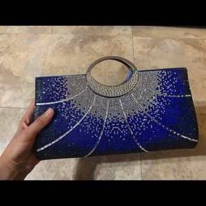 NEW blue clutch